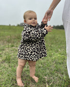 Baby wearing the Kids Safari animal print jersey in leopard print