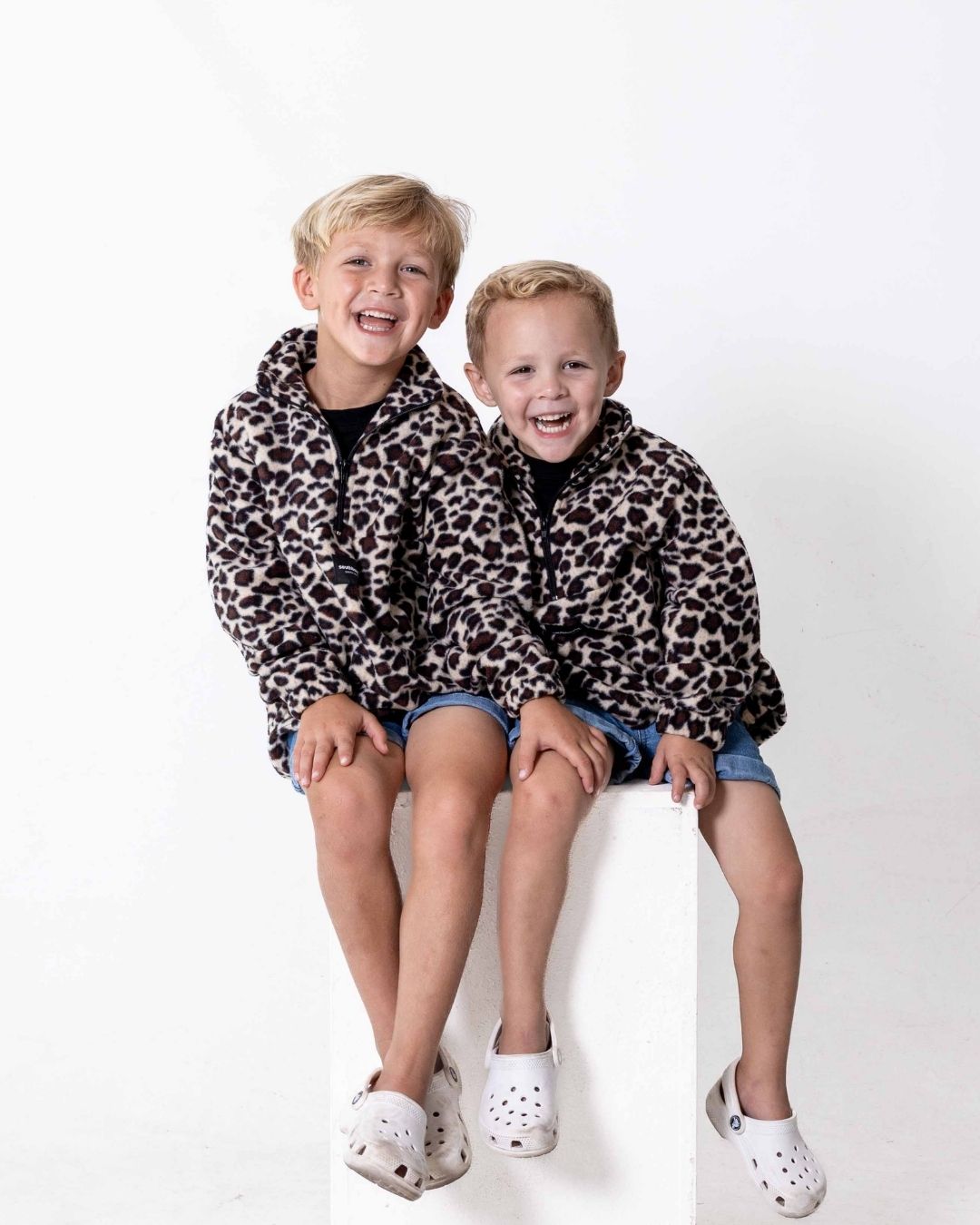 Children wearing the Kids Safari animal print jersey leopard print. 