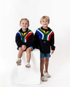 Two boys wearing the Kids polar fleece SA flag jerseys in black