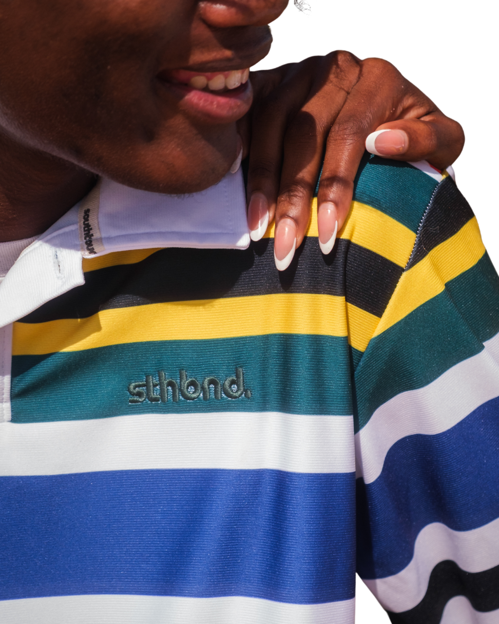 Male wearing a stripe polo shirt