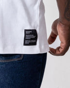 Close up of the patch work on the Oversized SA T- Shirt