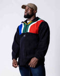 Man wearing a polar fleece SA flag jersey in colour black