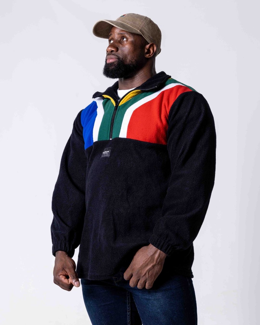 Man wearing a polar fleece SA flag jersey in colour black