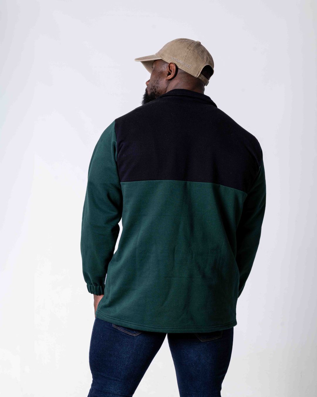 Back of male wearing the Premium cotton SA flag Jersey in colour green