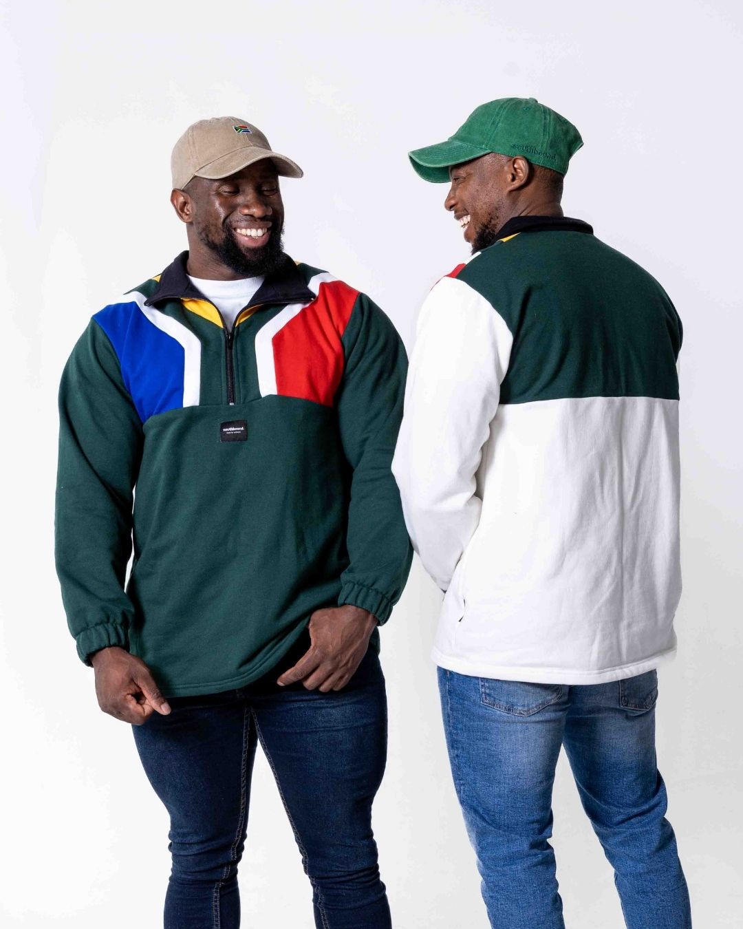 Two men wearing a premium coton SA flag jersey in green and cream