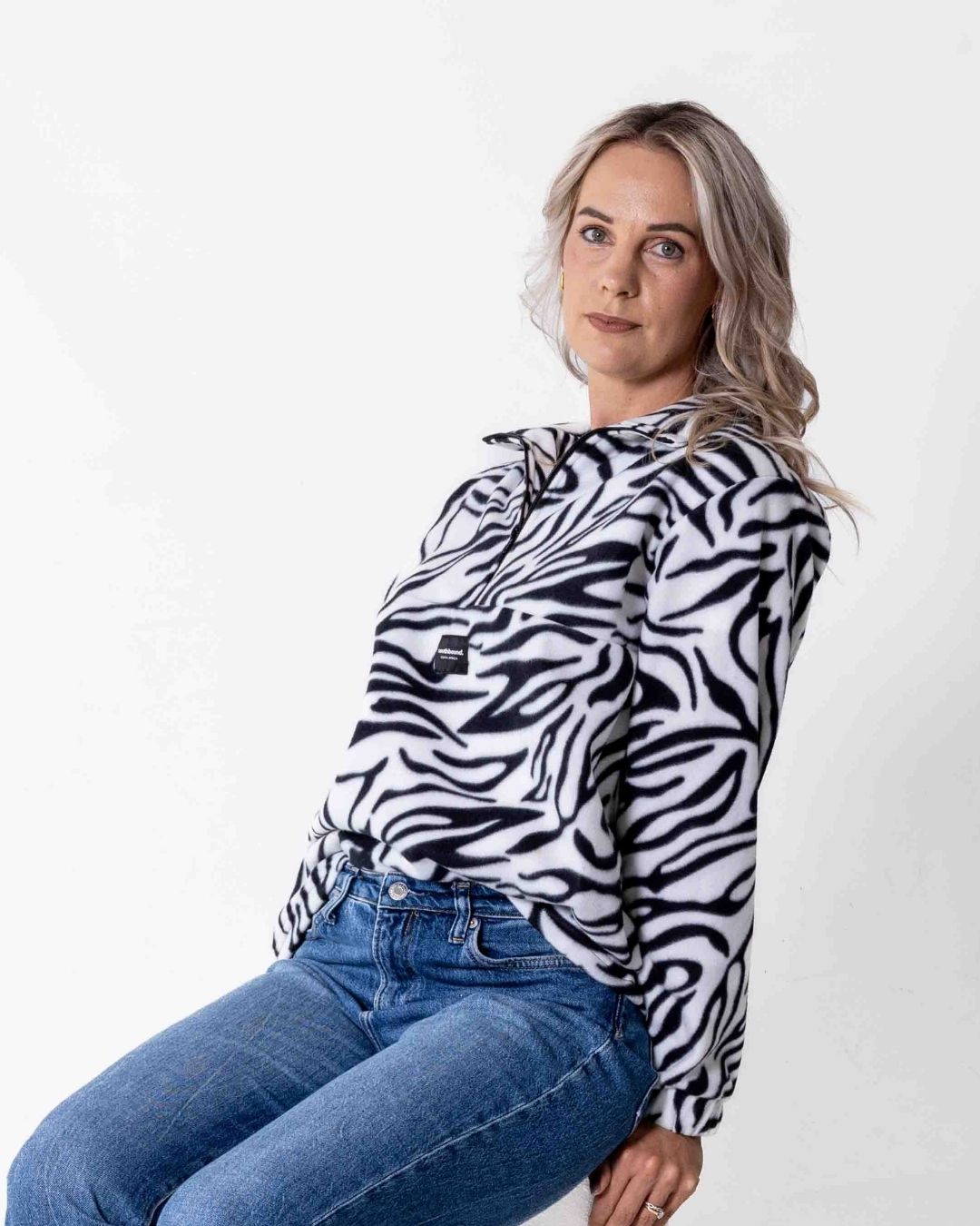 Female wearing a Safari animal print Jersey in zebra print