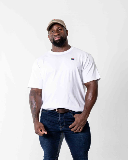 Male wearing a white cotton Oversized SA T- Shirt