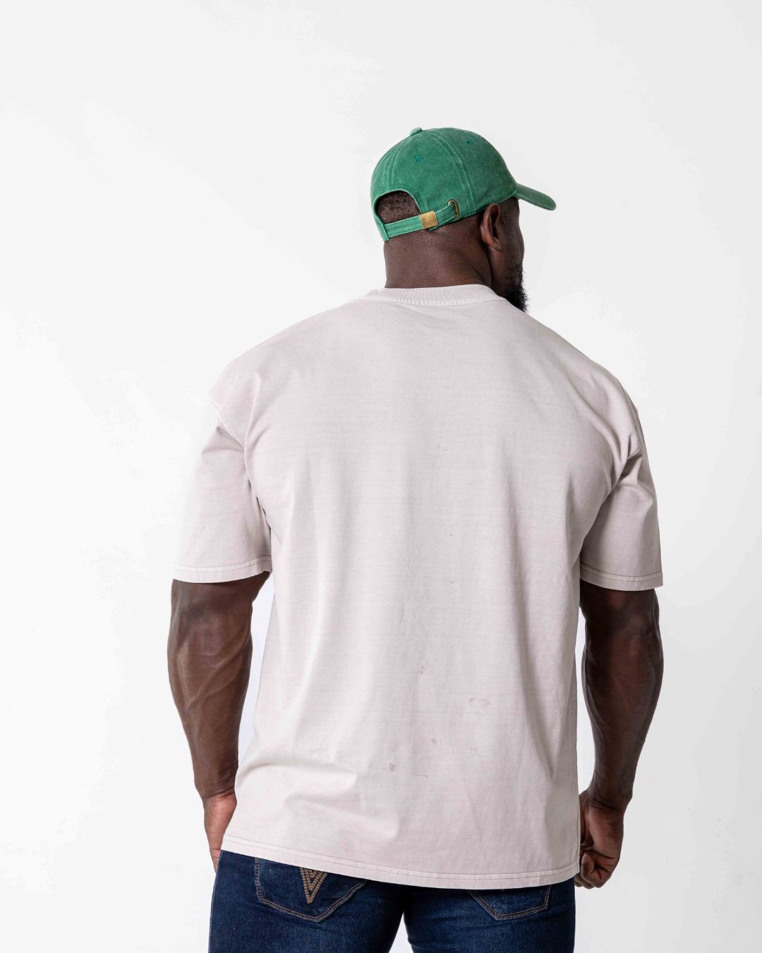 Back of a male wearing the southbound staple oversized  T- Shirt