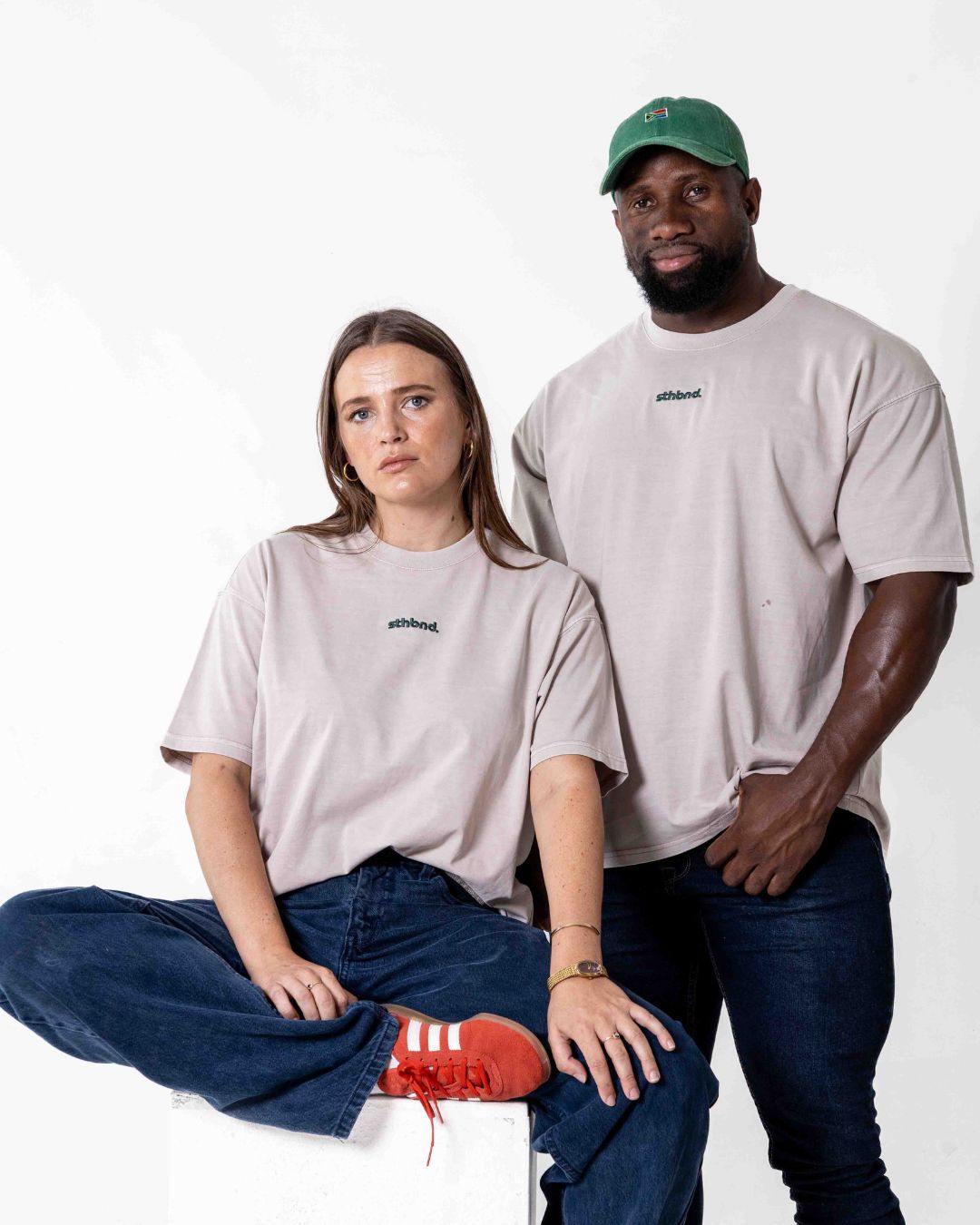Male and female wearing the southbound staple oversized  T- Shirt 