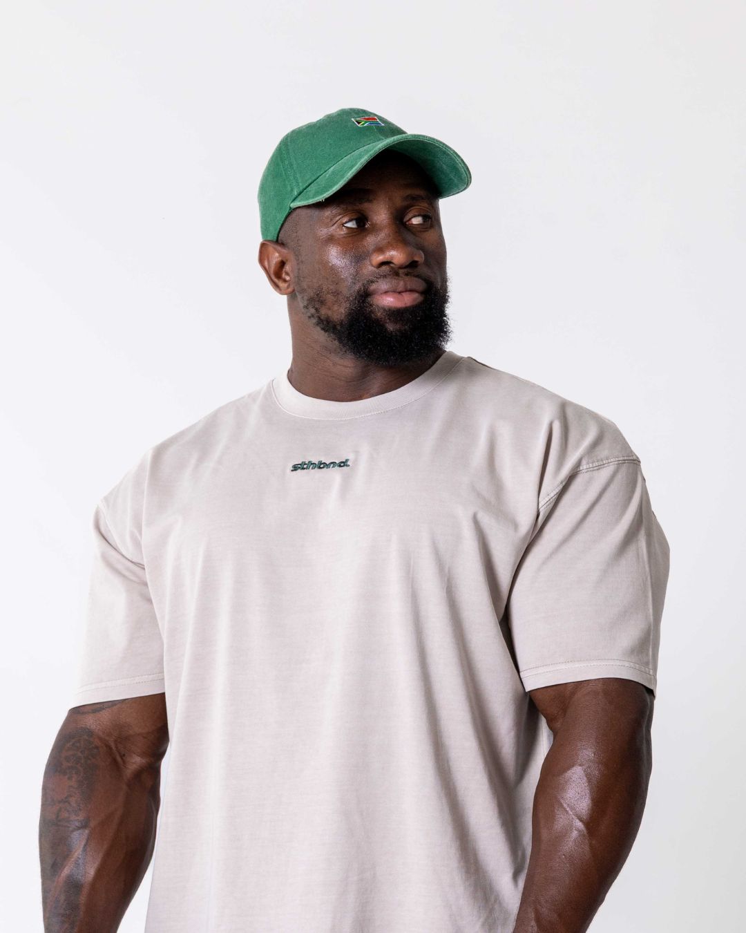 Close up of a male wearing the southbound staple oversized  T- Shirt