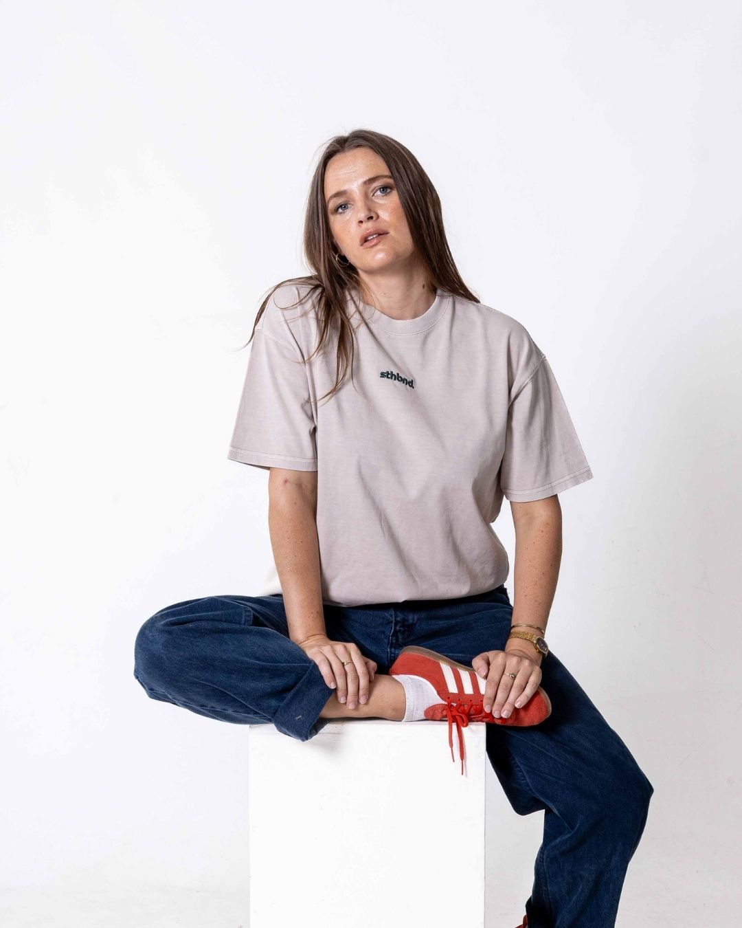 Female wearing a beige southbound staple oversized  T- Shirt