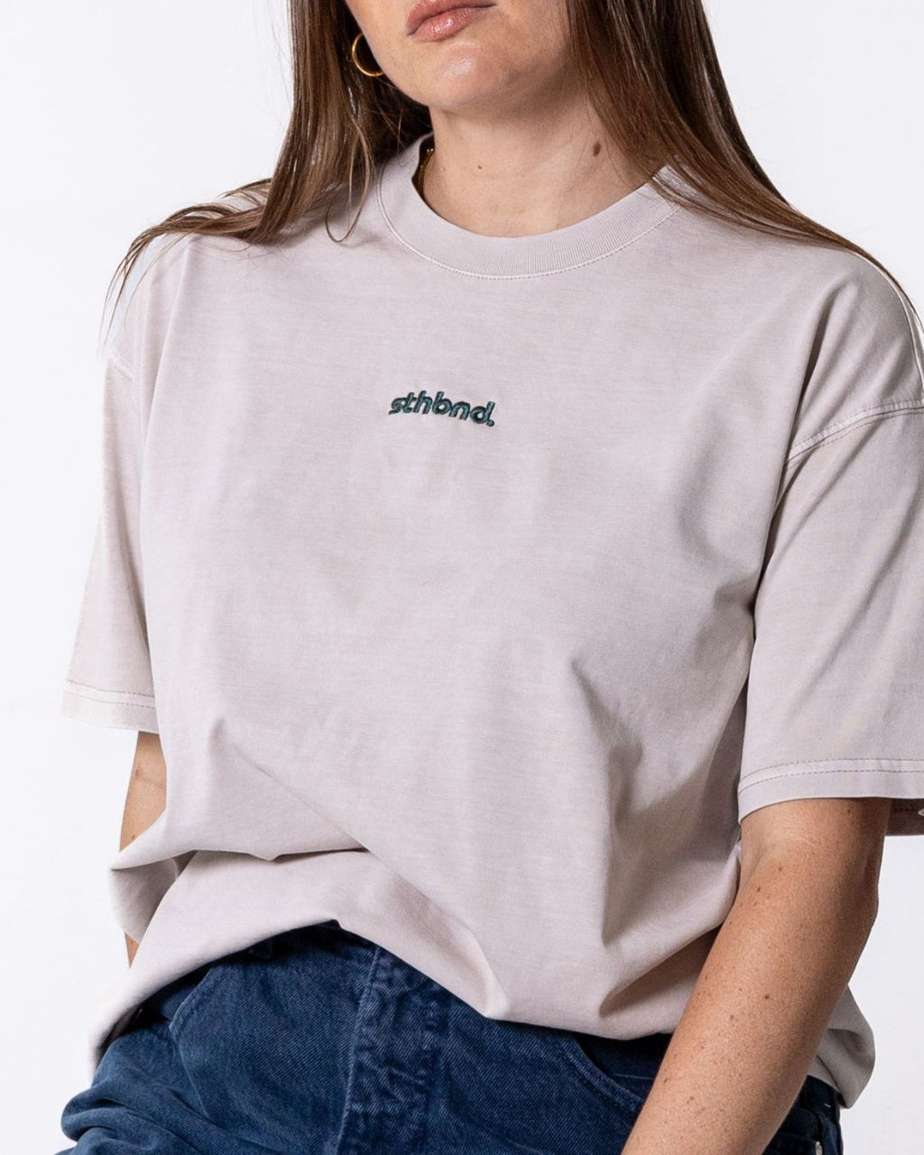 Female wearing a beigesouthbound staple oversized  T- Shirt